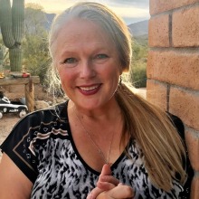 Photo of Dr. Laura M. Norman with a saguaro in background